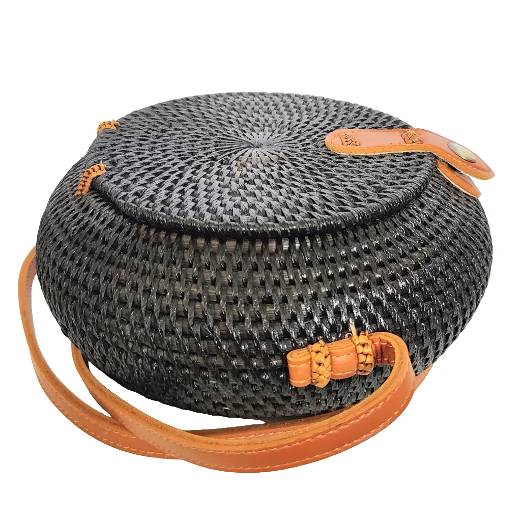 HANDBAG: HANDWOVEN ROUND SLING / CROSSBODY RATTAN BAG.
