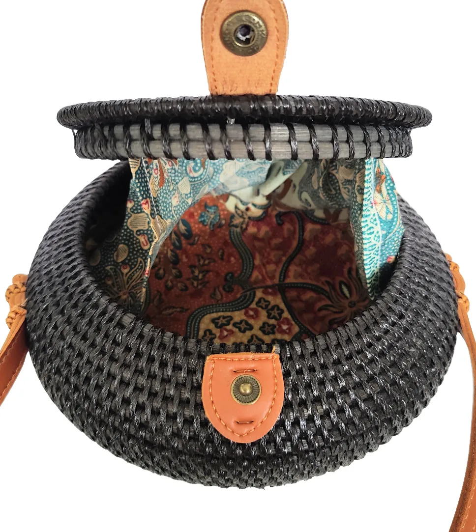 HANDBAG: HANDWOVEN ROUND SLING / CROSSBODY RATTAN BAG.