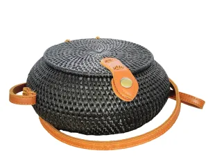 HANDBAG: HANDWOVEN ROUND SLING / CROSSBODY RATTAN BAG.