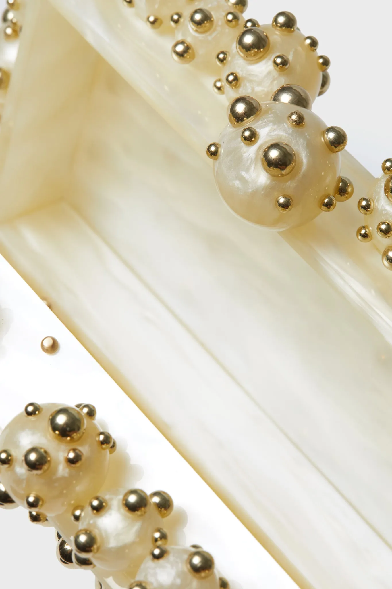 Ivory and Shiny Brass Eos Clutch